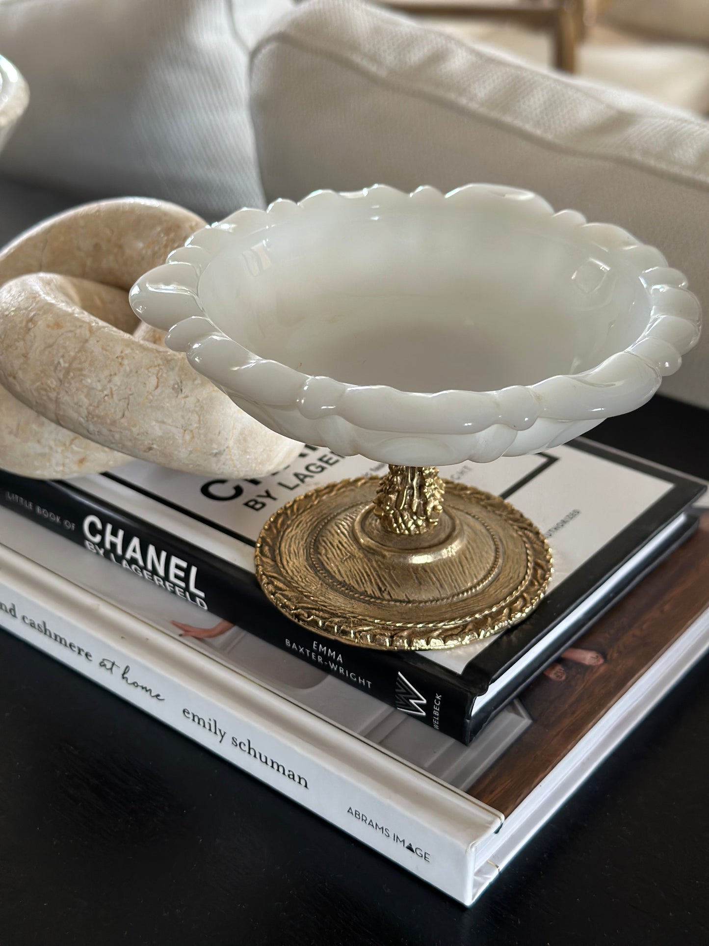 Small white glass dish with gold base