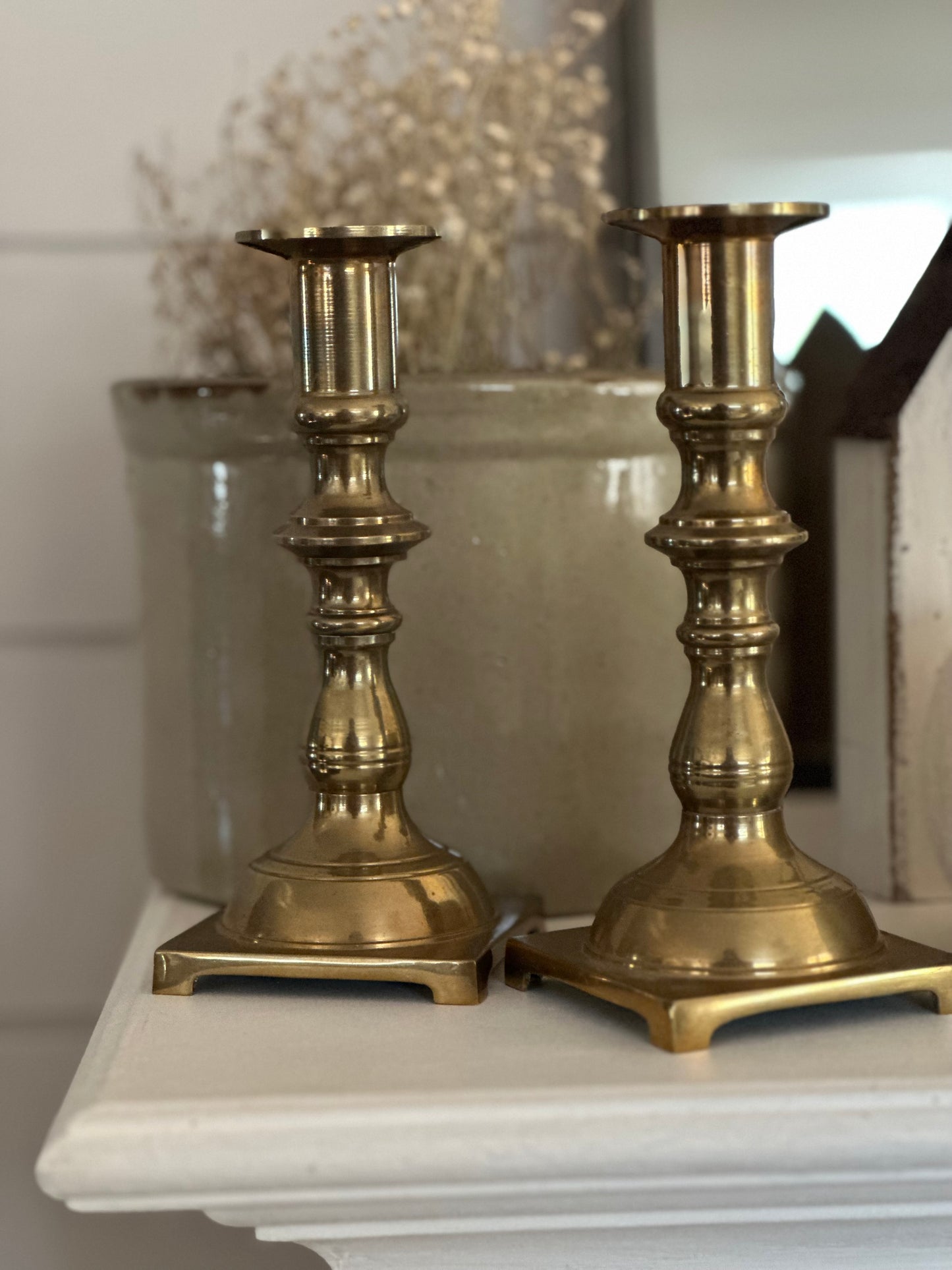 Pair of brass candle sticks