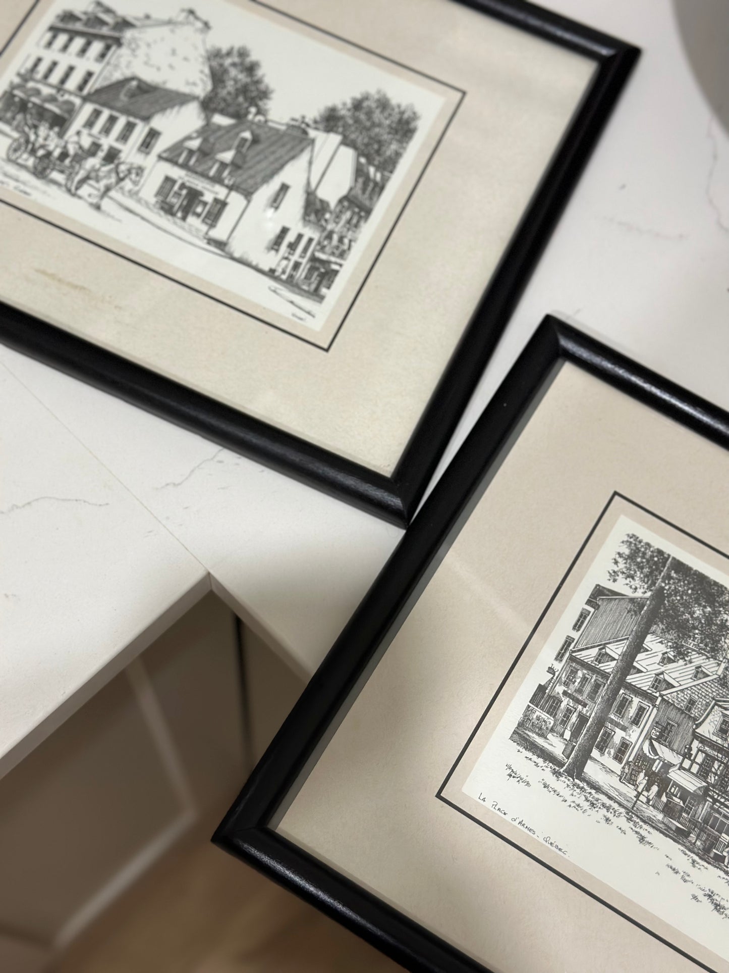 Pair of black framed photos