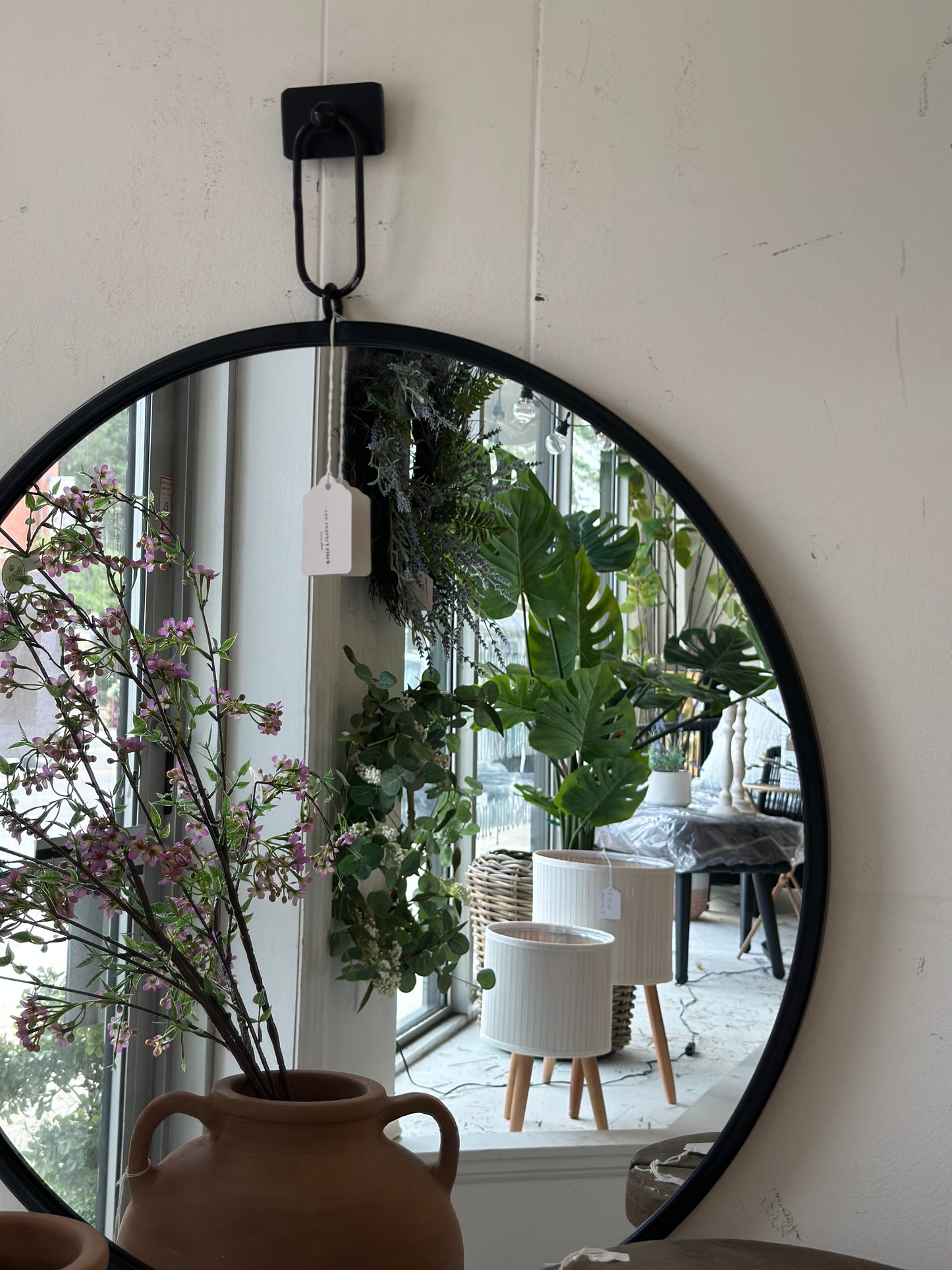 Black round mirror with hanging hook