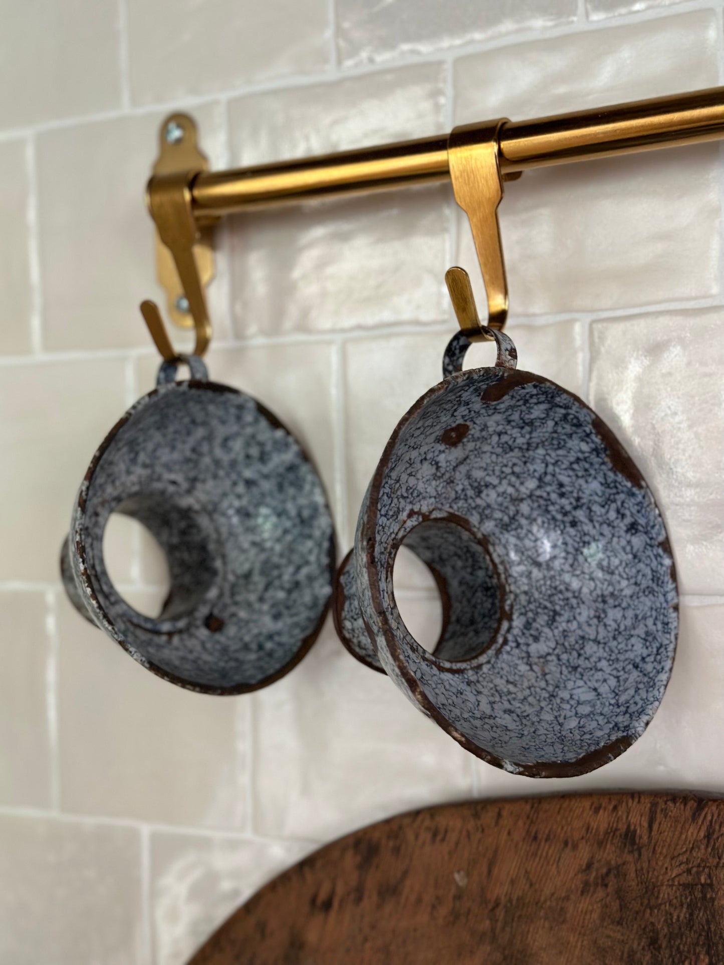 Pair of small blue tin collanders
