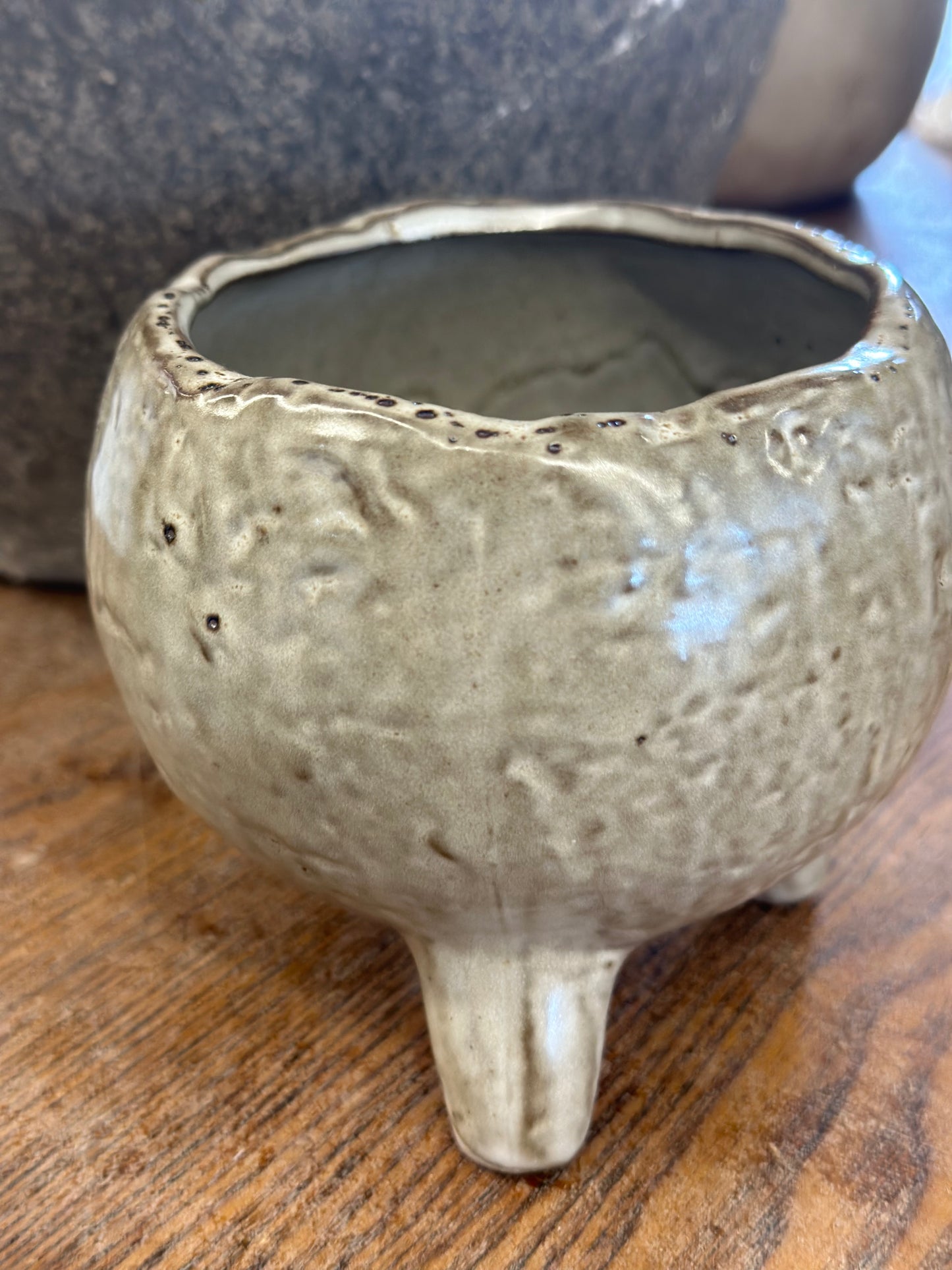 Footed pot glazed green