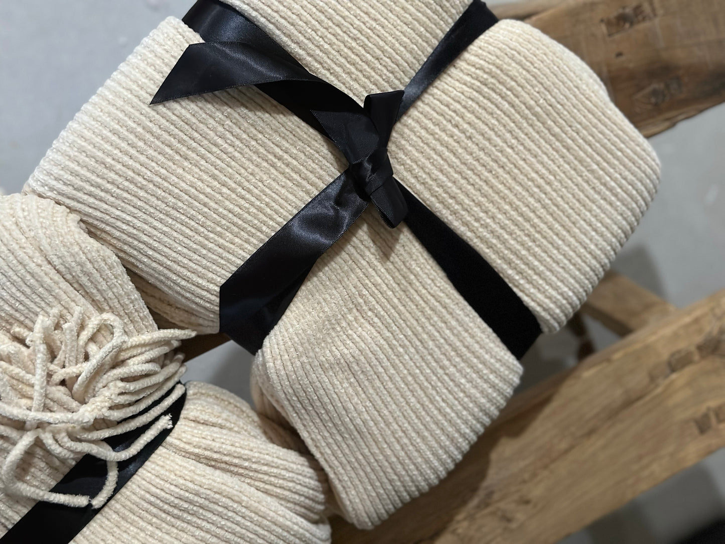 Fringed cream blanket