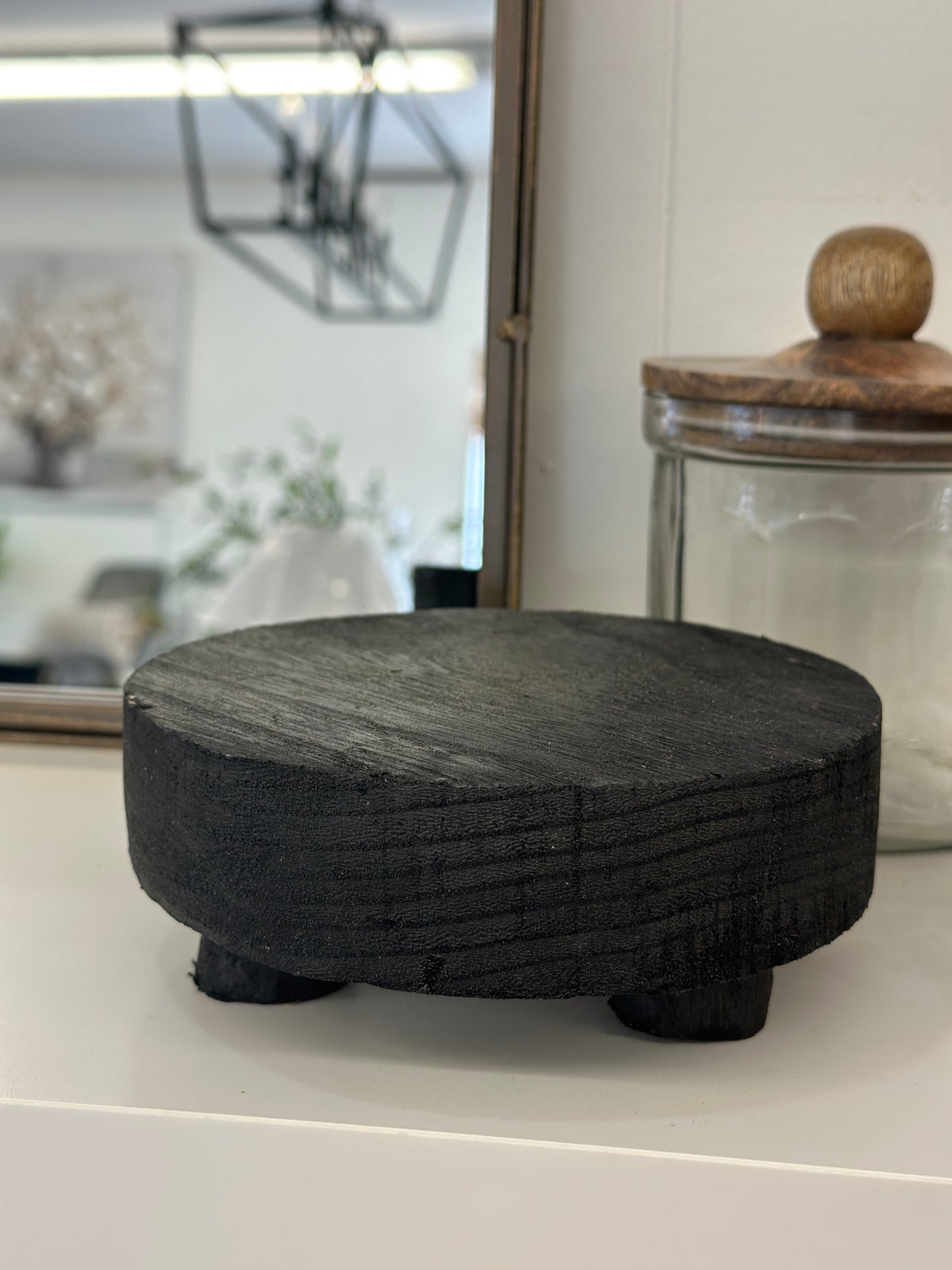 Dark wood candle riser