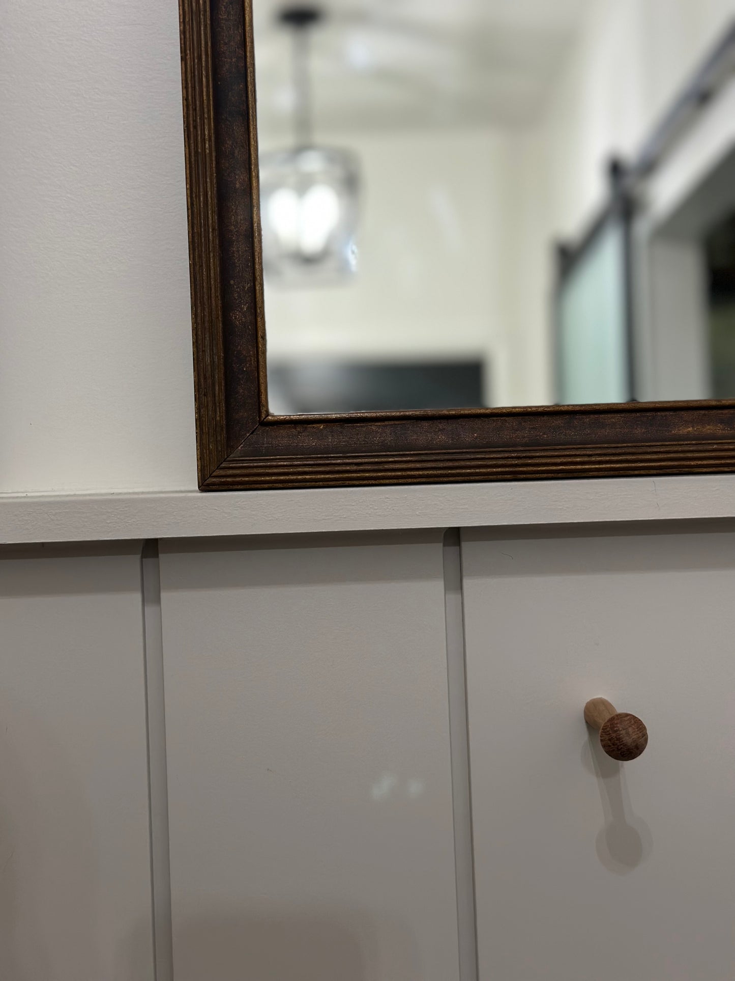 Wood framed small mirror