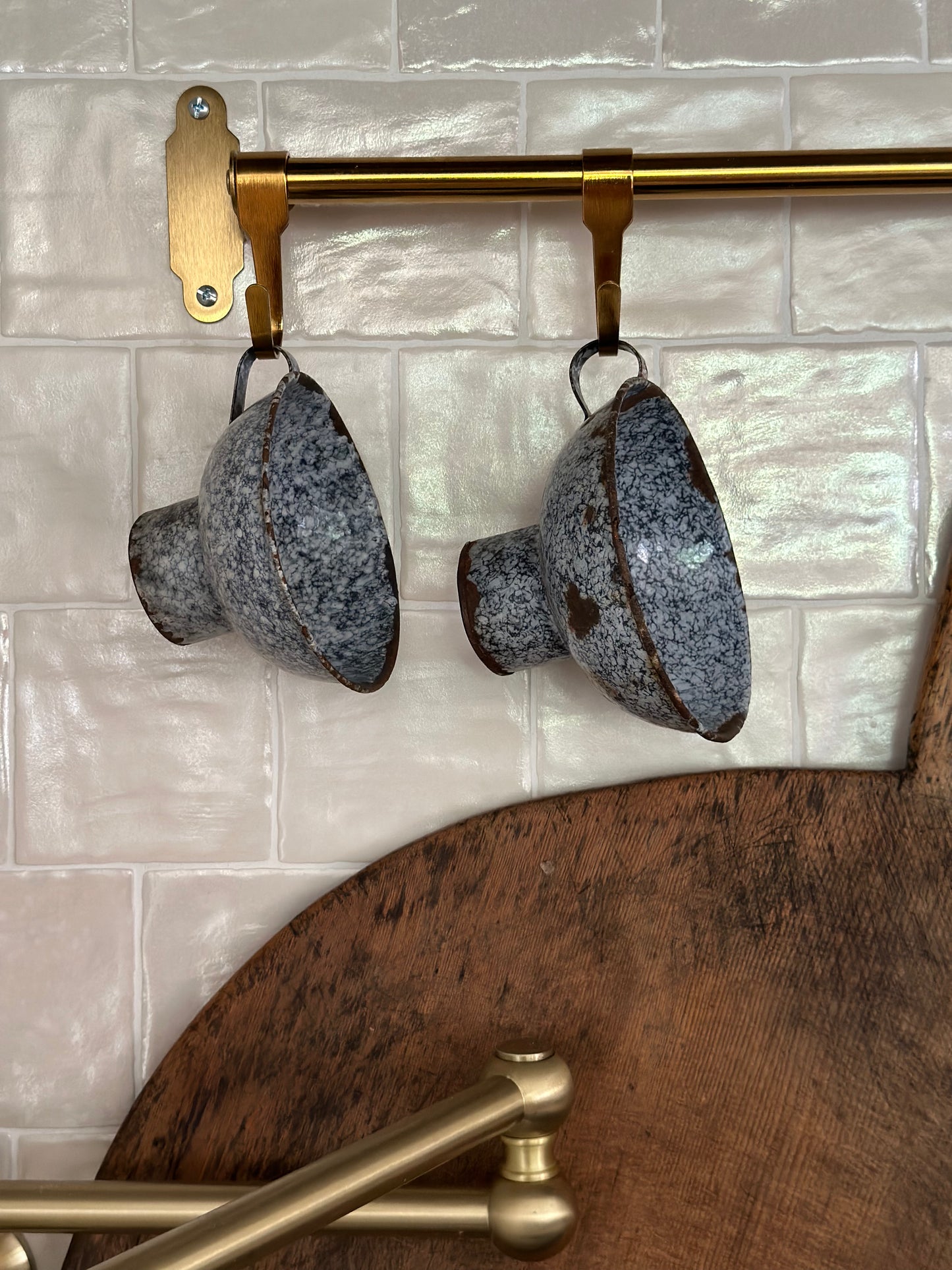 Pair of small blue tin collanders