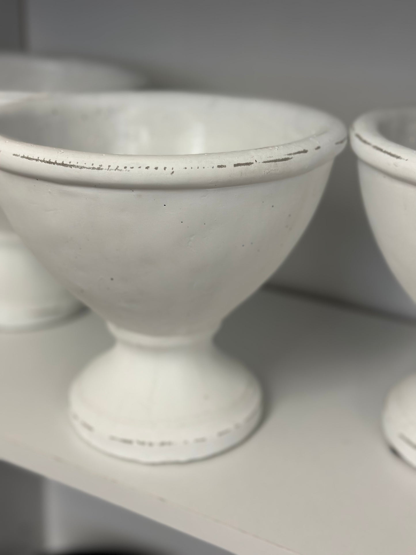 White pedestal pot