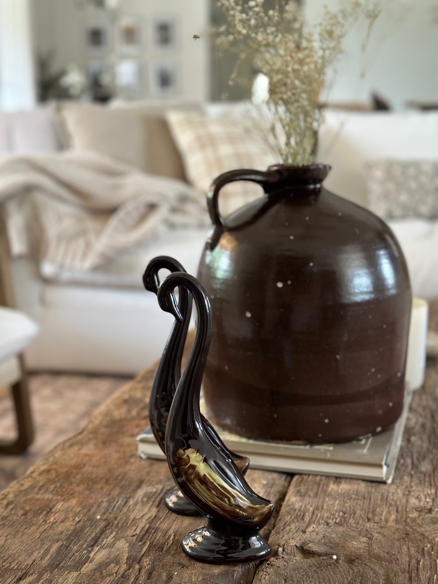 Pair of vintage brown glass swans
