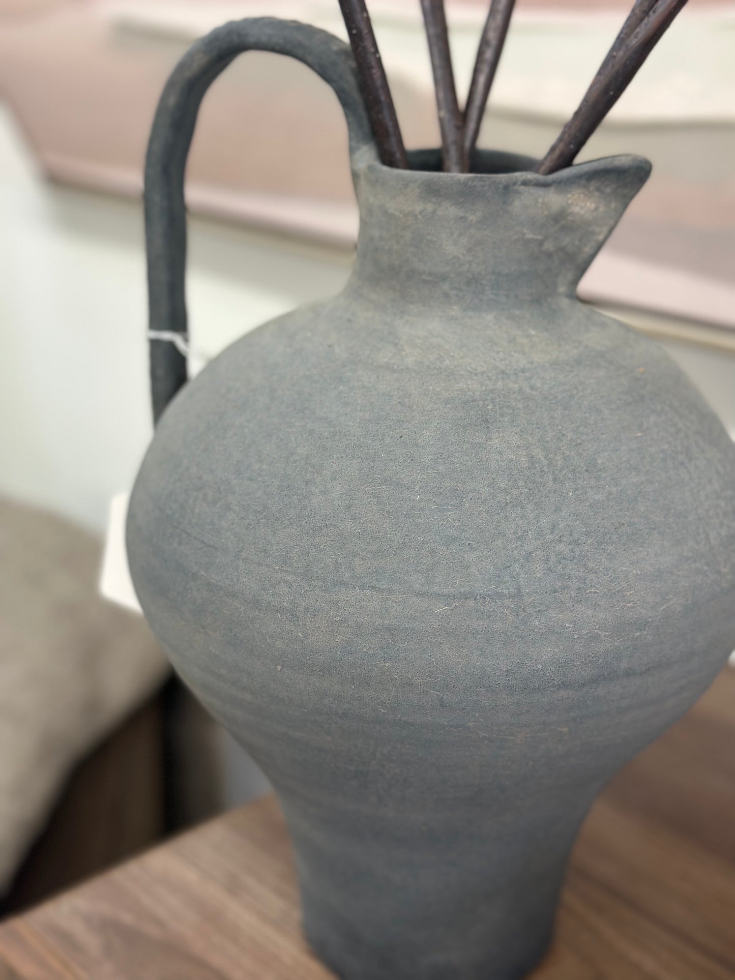 Tall slate jug with handle