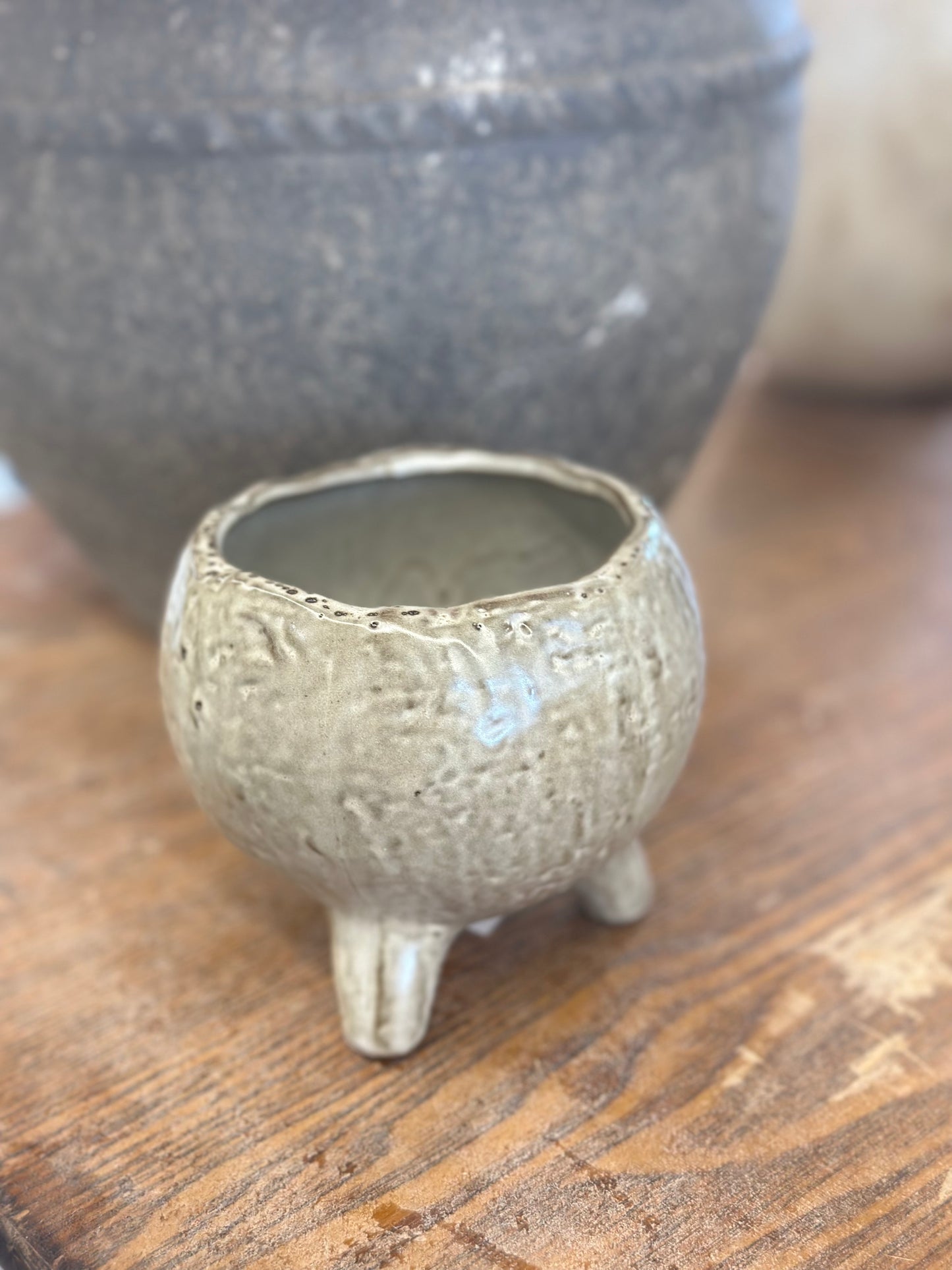 Footed pot glazed green
