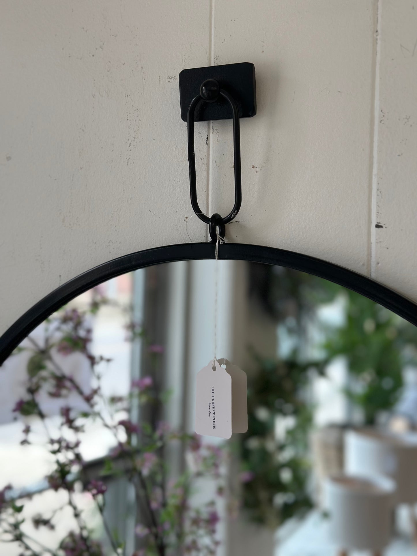 Black round mirror with hanging hook