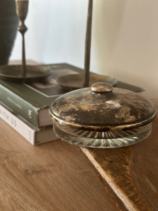 Glass dish with bronze lid