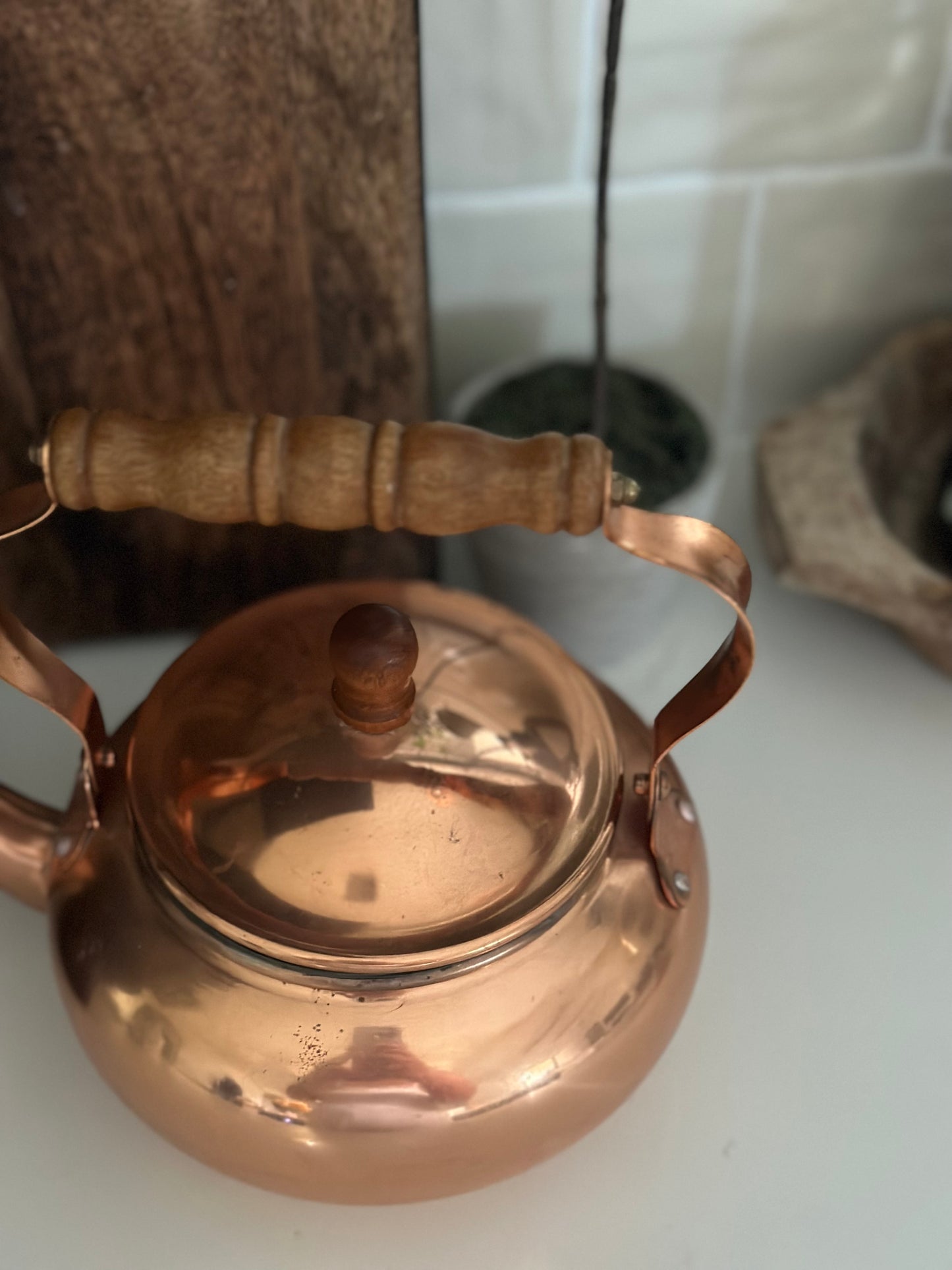 Copper tea pot with wood handle