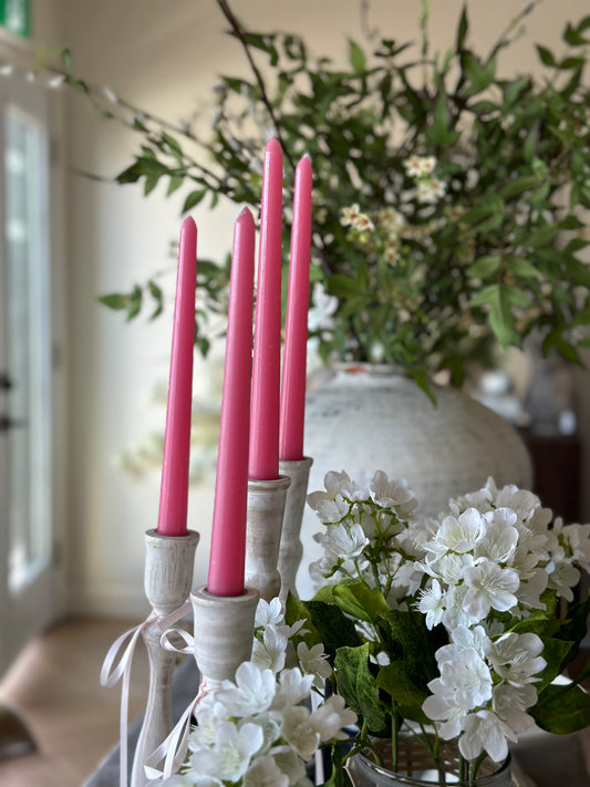 Pink taper candlesticks