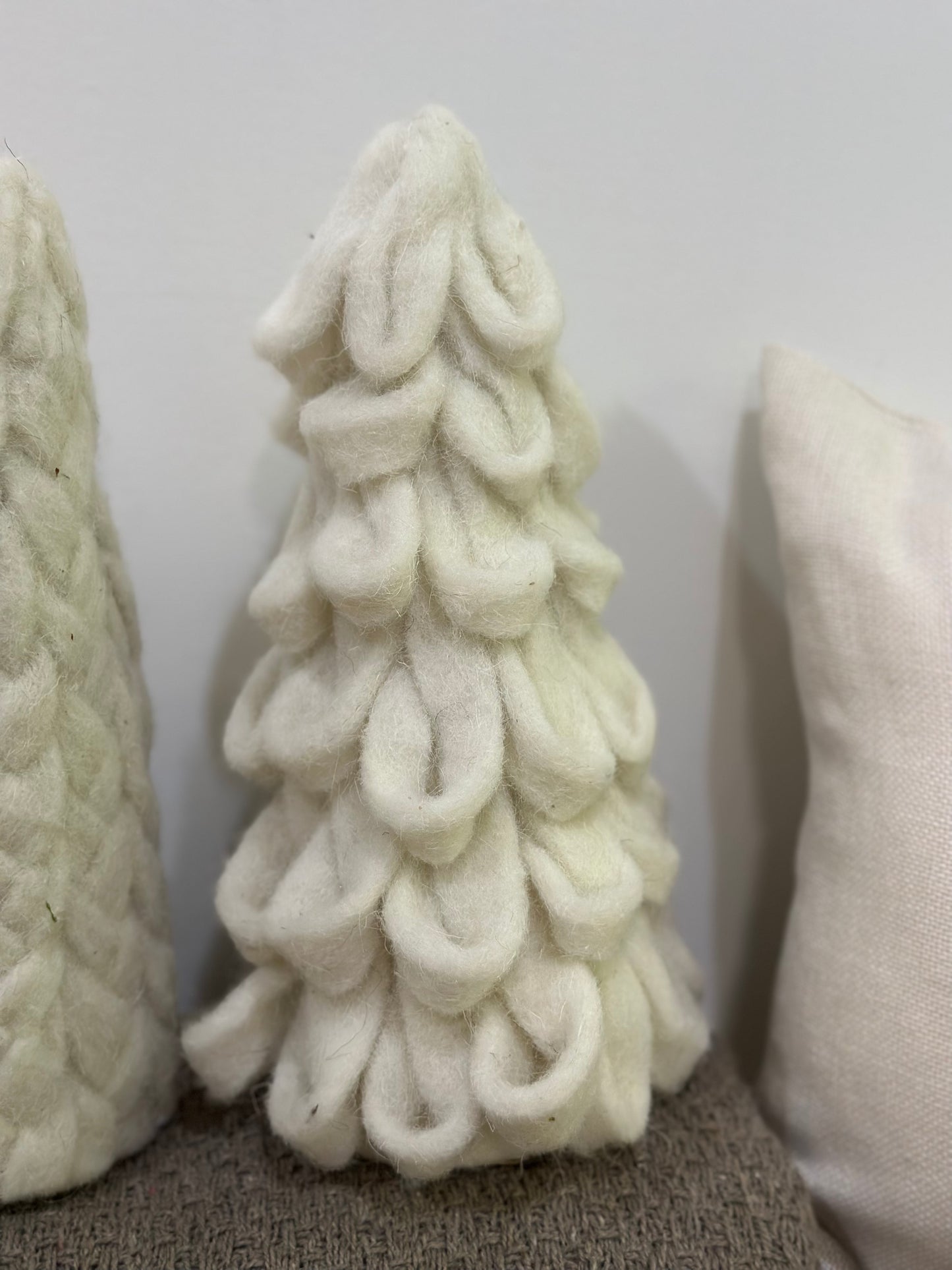 White woven yarn tree “loops”