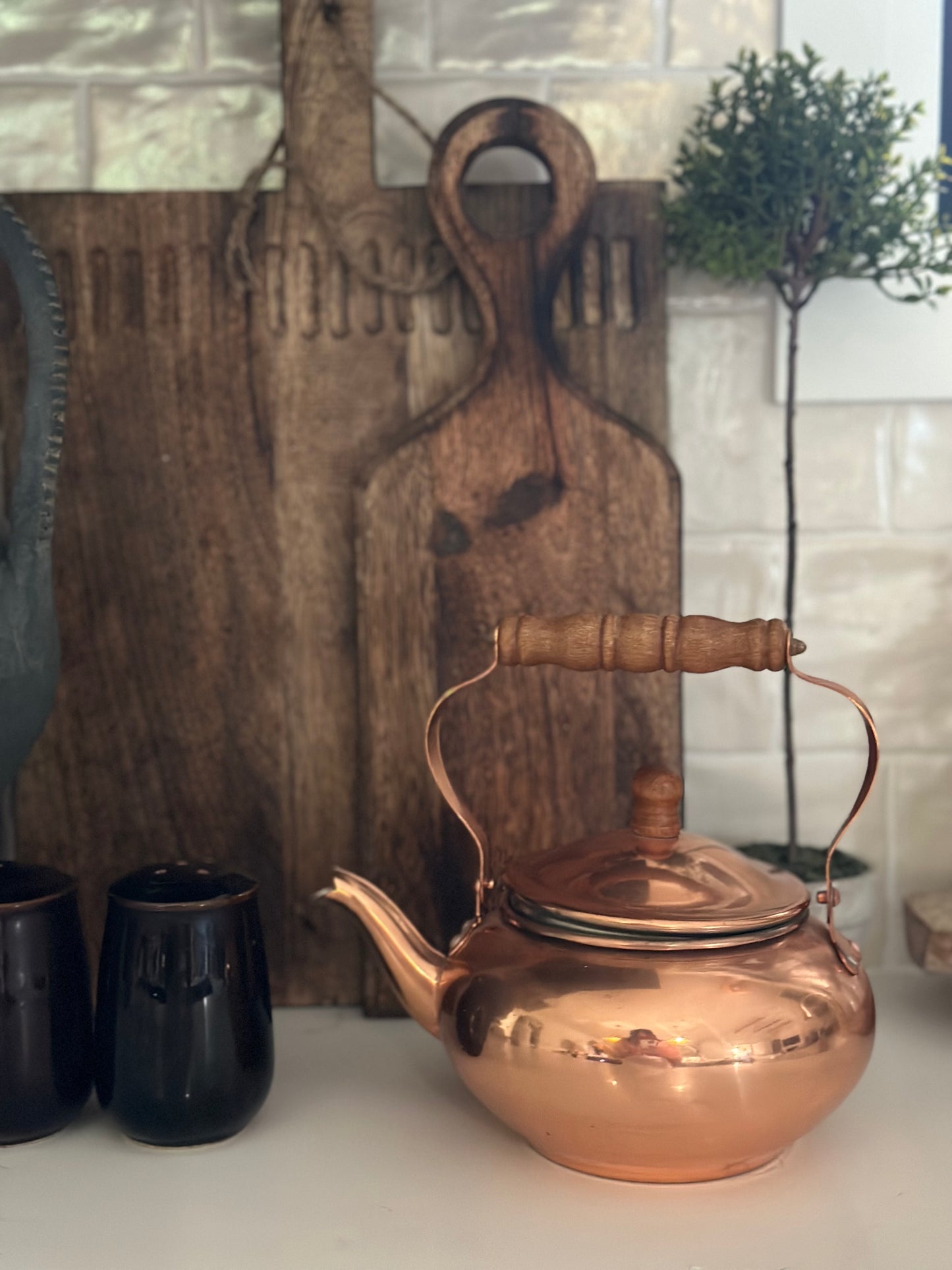 Copper tea pot with wood handle