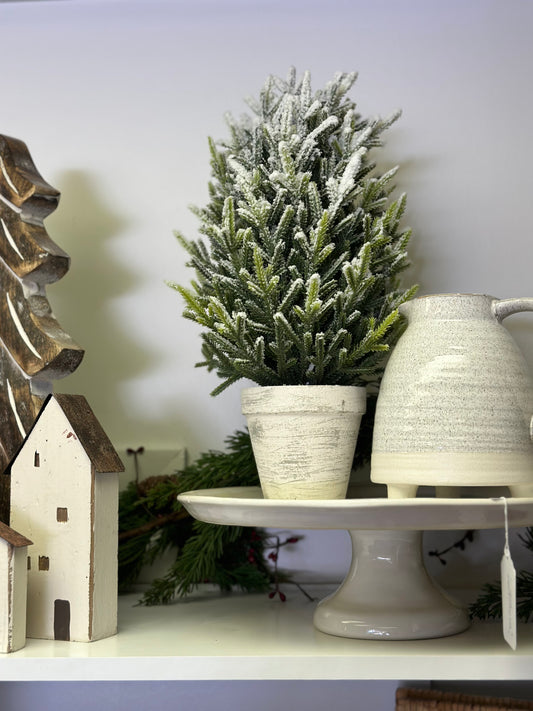 Potted flocked trees in white pot