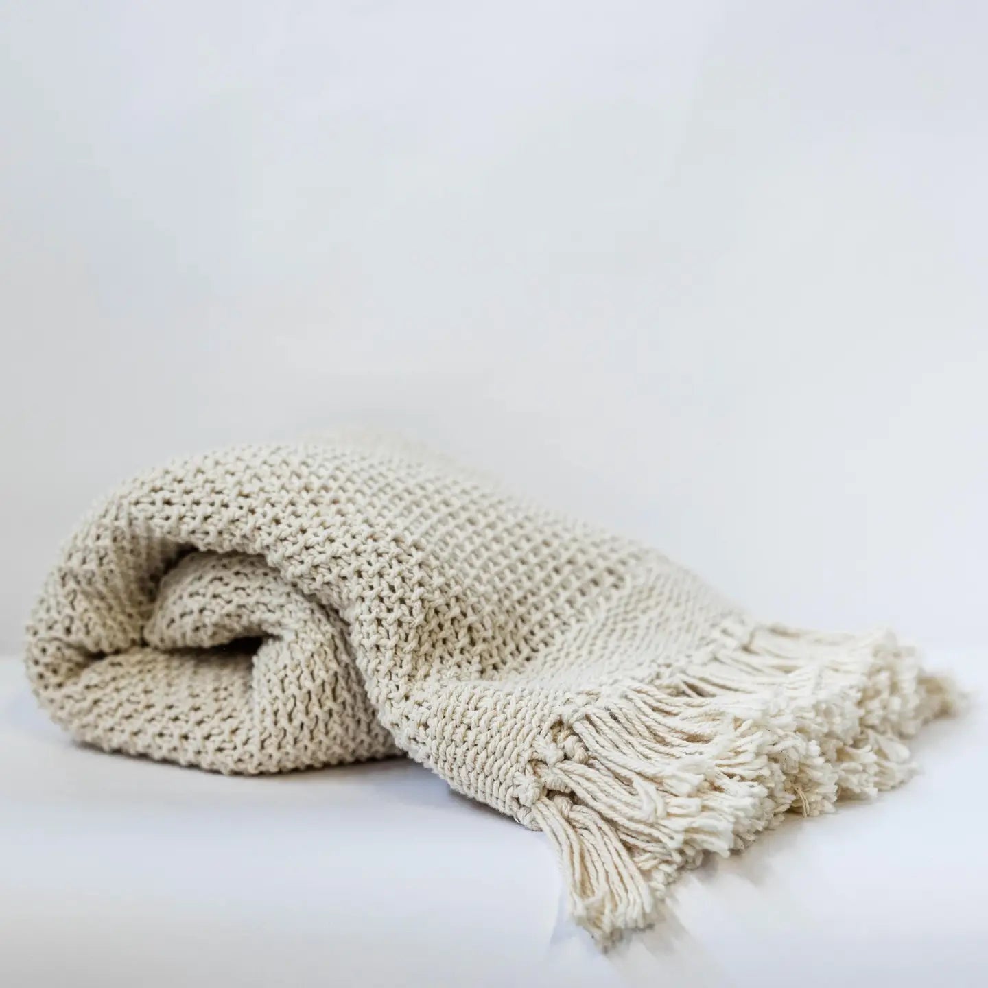50” x 65” Knitted Cream Cotton Throw