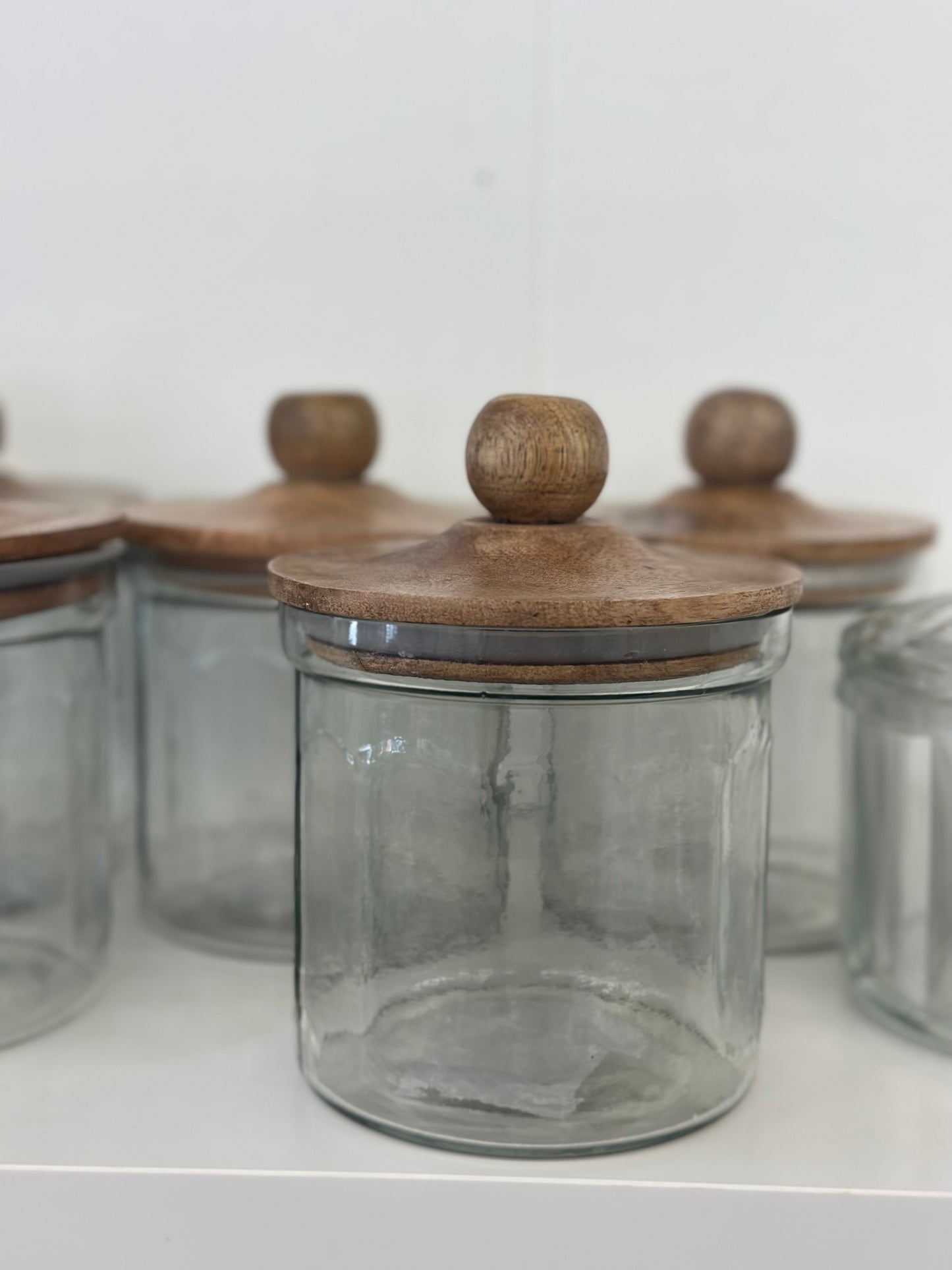 Glass jar with wood lid