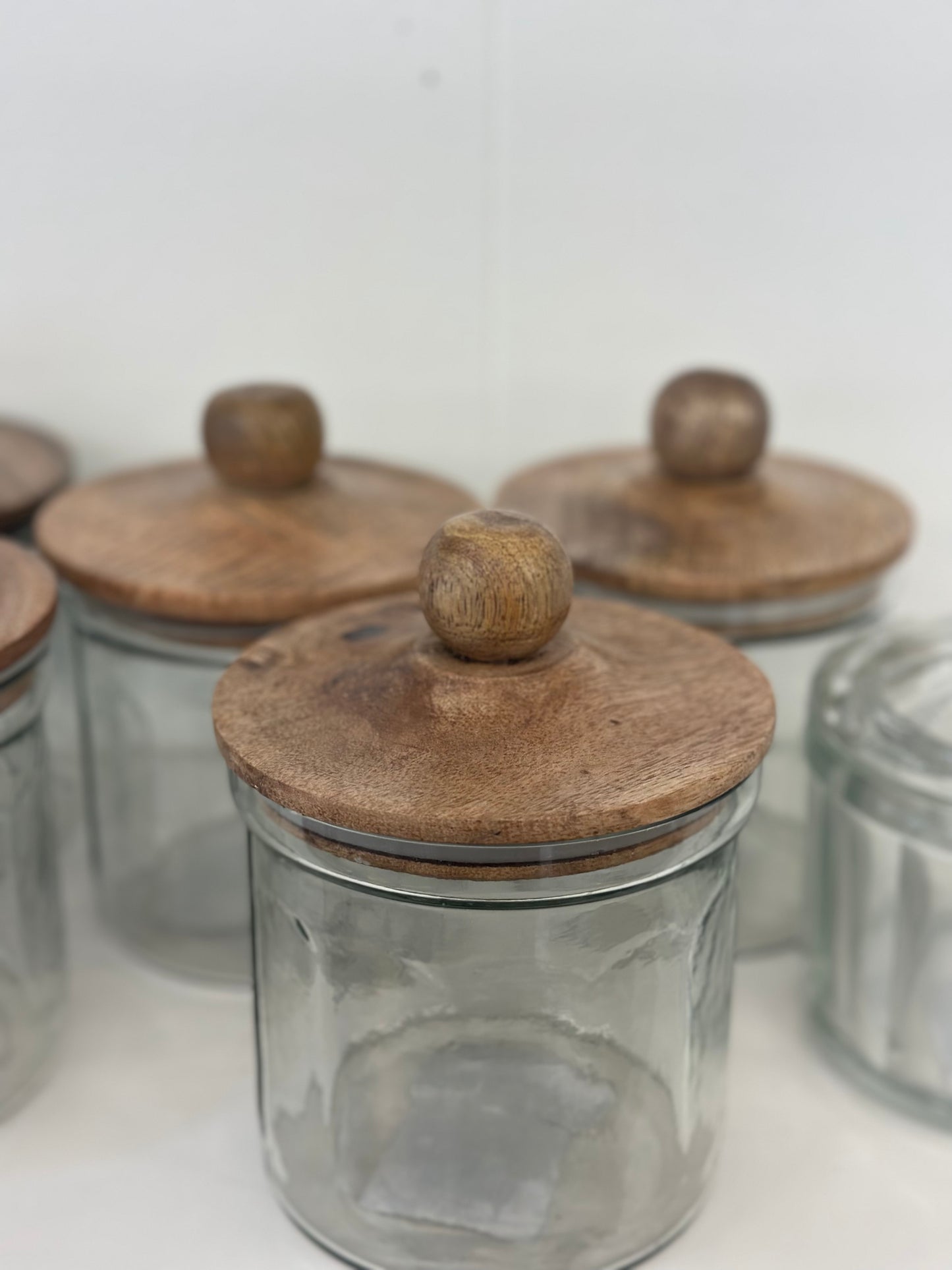 Glass jar with wood lid