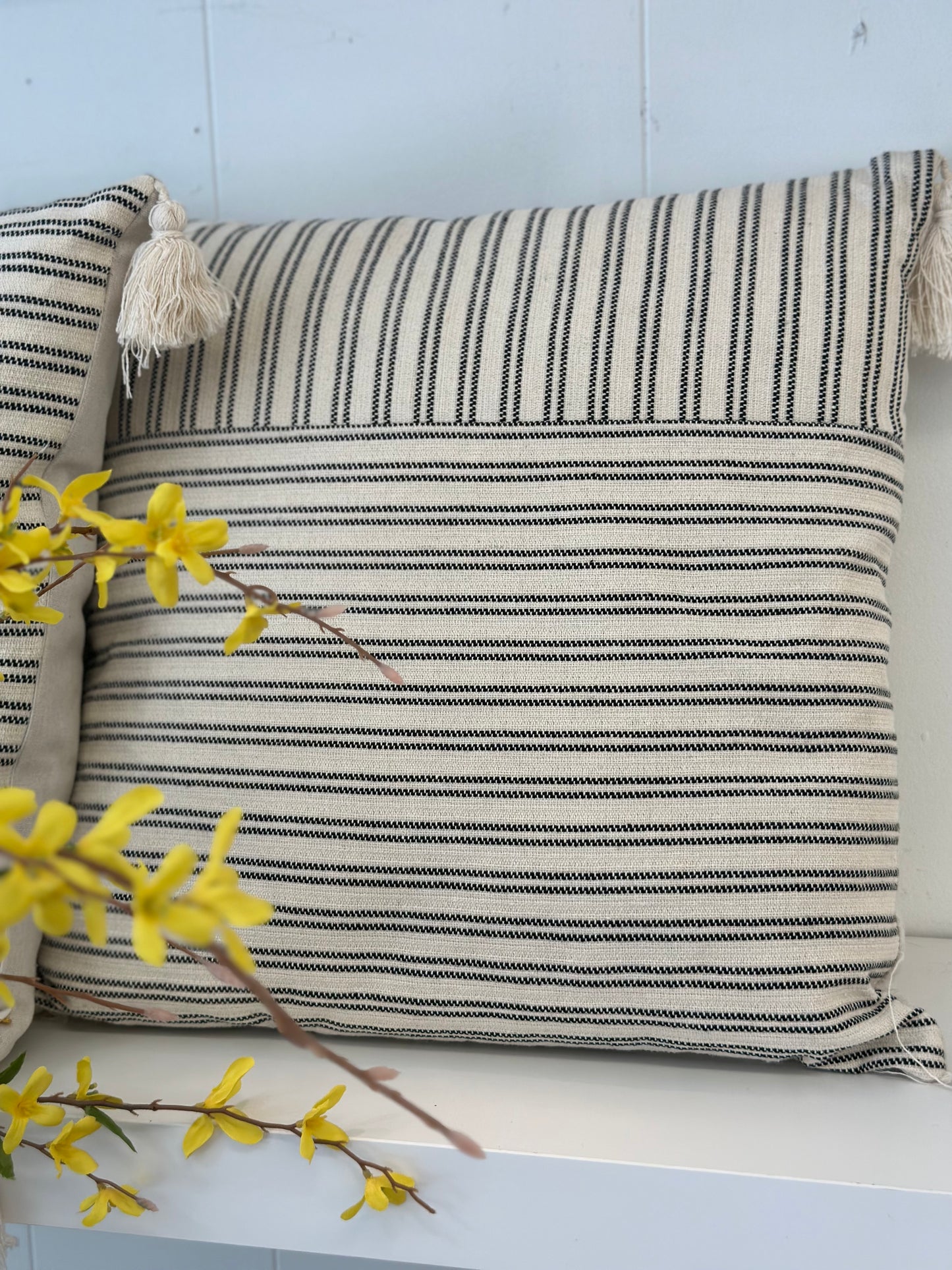 Striped and cream pillow