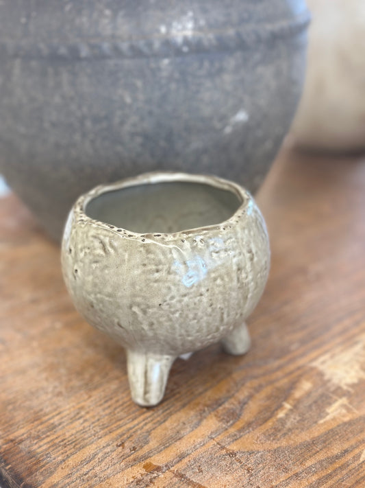 Footed pot glazed green